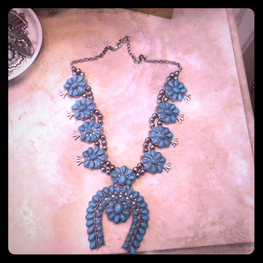 Faux turquoise squash blossom